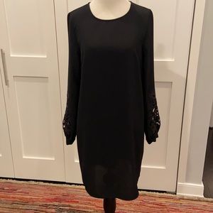 Black shift dress with sleeve details